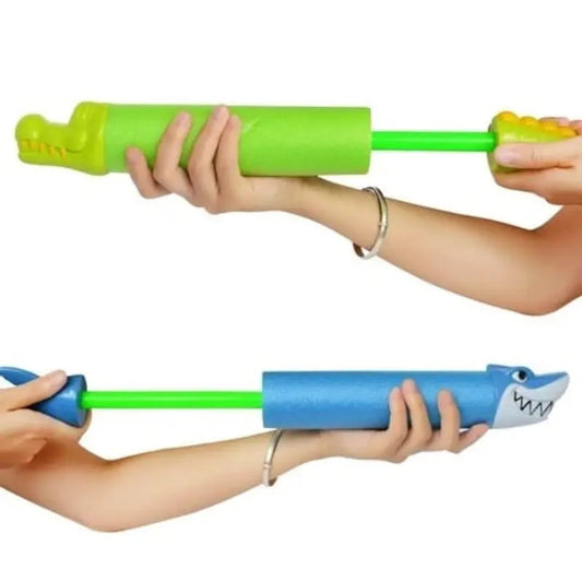 Two hands holding green and blue water blasters shaped like alligators and sharks on a white background-Greater Toys Store