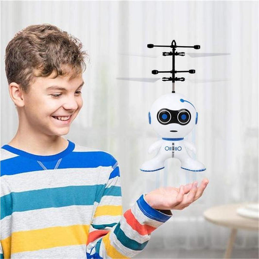 Kid playing with Electric Flying Robot Mini Drone - Greater Toys Store