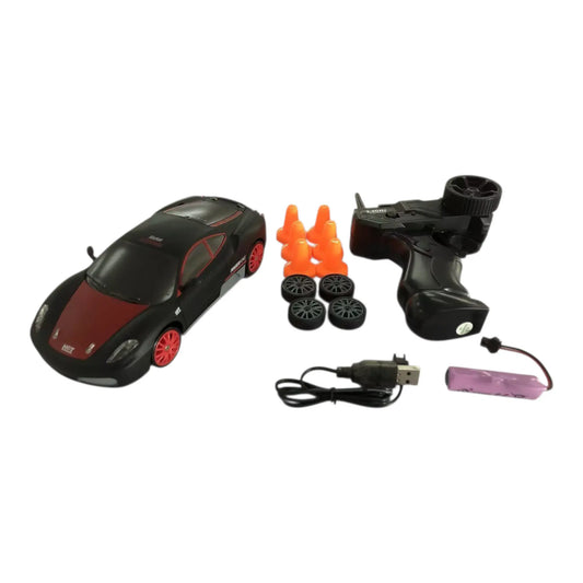 2.4G Drift 4WD RC Toy Car For Children With Remote GTR Model AE86 with charger, spare tires, cones, and controller shown on white surface.