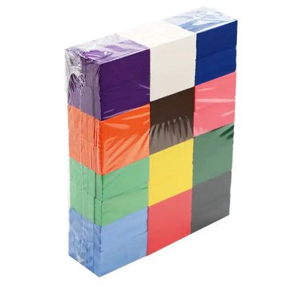 Stack of colorful building dominos blocks with a clear plastic wrap on a white background—Greater Toys Store