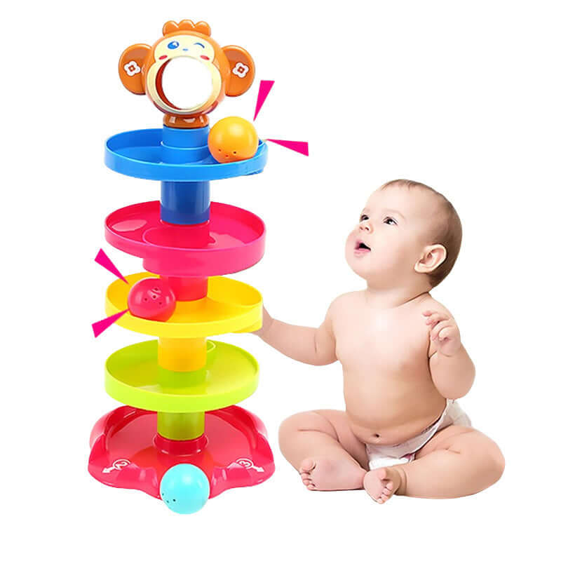 Baby playing with a colorful toy tower on a white background - Greater Toys Store