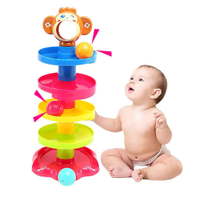 Baby playing with a colorful toy tower on a white background - Greater Toys Store