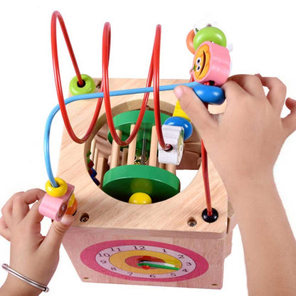 Children's wooden maze toy with colorful beads and a clock face, being played with by hands-Greater Toys Store